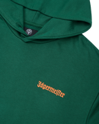 Green hoodie with an orange Jägermeister logo on the chest.
