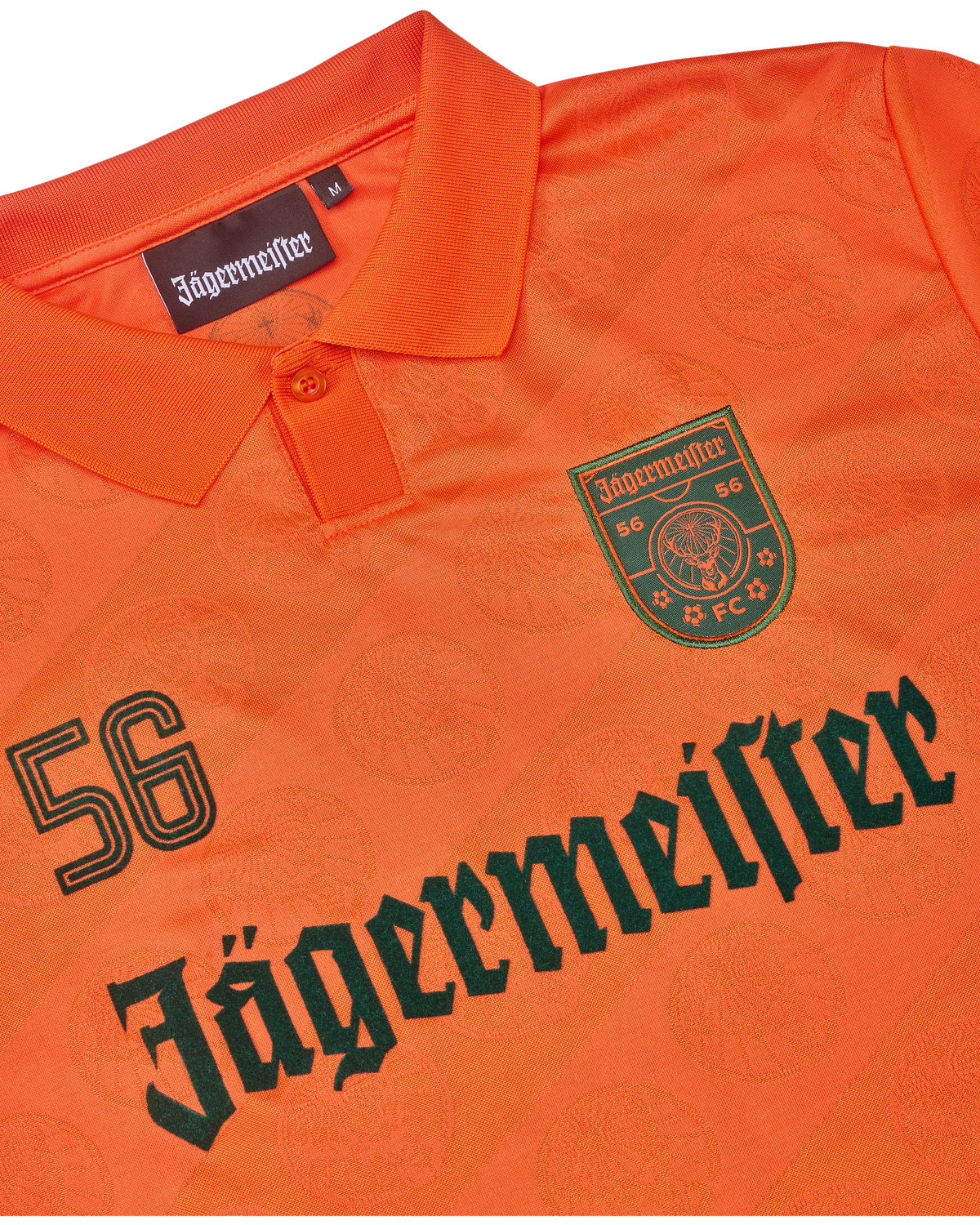 Tricou portocaliu cu branding Jägermeister.