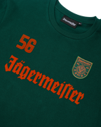 Bluză cu mânecă lungă verde Jägermeister, cu logoul Jägermeister portocaliu și un „56”.