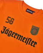 Bluză cu mânecă lungă portocalie Jägermeister, cu logoul Jägermeister negru și un „56”.