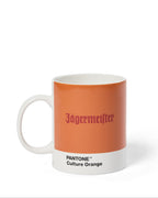 Orange mug with Jägermeister branding and Pantone color swatch on a white background