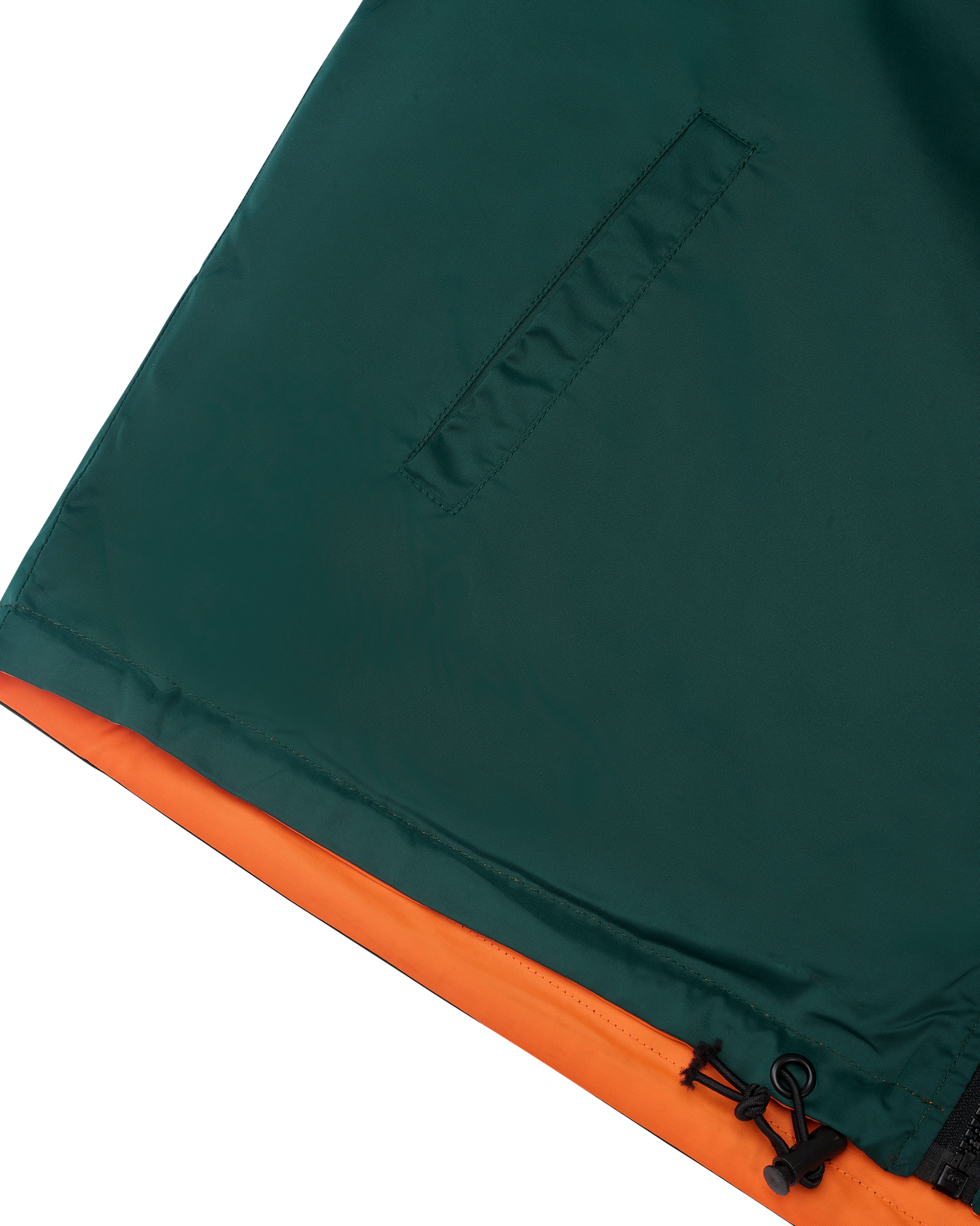 Green and orange fabric of the reversible Jägermeister jacket
